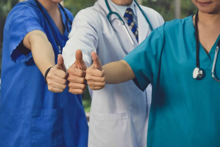 Group doctor teamwork thump up success,Professional doctor hospital medicine cooperation insurance healthcare medical good team